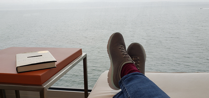 Looking over an expanse of water from a cruise deck chair